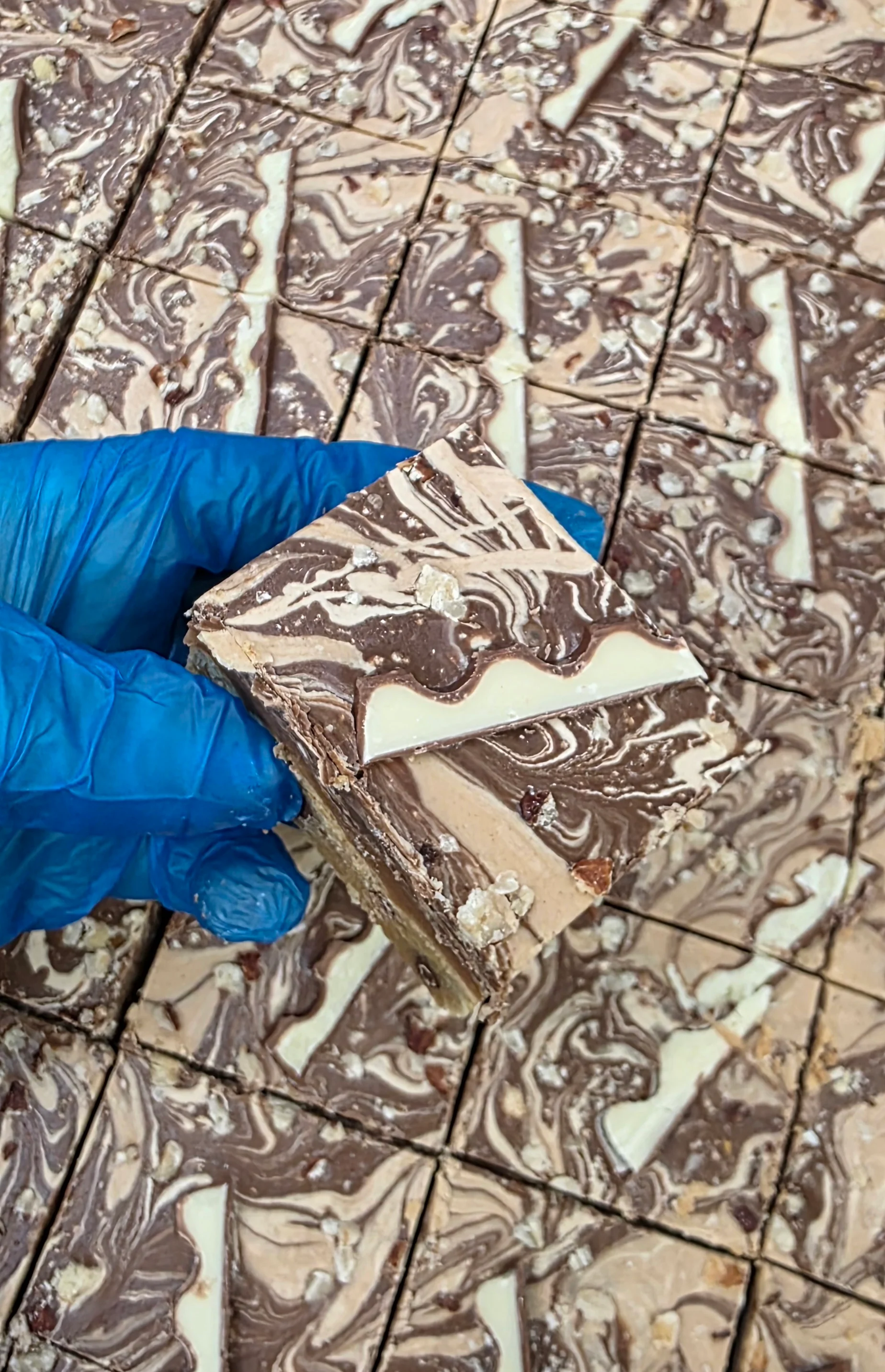 White Chocolate Hazelnut & Kinder Millionaire Cookie Piece - Image 3